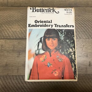 May include: Vintage Butterick pattern 4574 for Oriental Embroidery Transfers. The cover features a woman wearing a red embroidered blouse with a floral design.