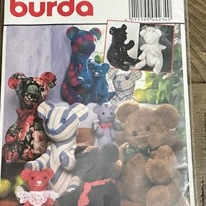 May include: A Burda sewing pattern envelope for a soft toy animal in 3 sizes, 40 cm, 30 cm, and 20 cm. The packaging features illustrations of various teddy bears made from different fabrics, including floral, striped, and solid colours, with a barcode and product number 4234.