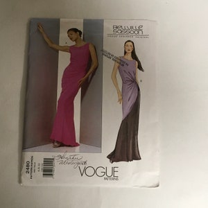 May include: Vogue sewing pattern 2480 for a long evening gown with a fitted bodice and a flowing skirt. The pattern is by Bellville Sassoon, a Vogue designer original.