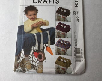 McCall’s Crafts Sewing Pattern Baby Grocery Cart Liner Handle Cover & Toys Vegetables Toy Dangler Hanging Toys Attached Toys New