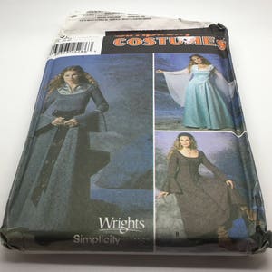 Peut inclure: Un patron de couture pour un costume médiéval. Le patron comprend trois styles de robes différents, tous avec des manches longues et des jupes amples. Le patron est de Simplicity et est pour les tailles 12-20.