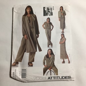 May include: A sewing pattern for a dress, jacket, and pants. The pattern is for sizes 18-20-22 and is called "Vogue Attitudes" 2148.