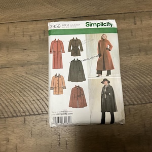 May include: Simplicity sewing pattern number 3959 for sizes US 16, 18, 20, 22, 24, EUR 42, 44, 46, 48, 50, FR 44, 46, 48, 50, 52. The pattern includes instructions for making a long coat, a cape, and a short coat. The pattern is printed on a white background with a green border.