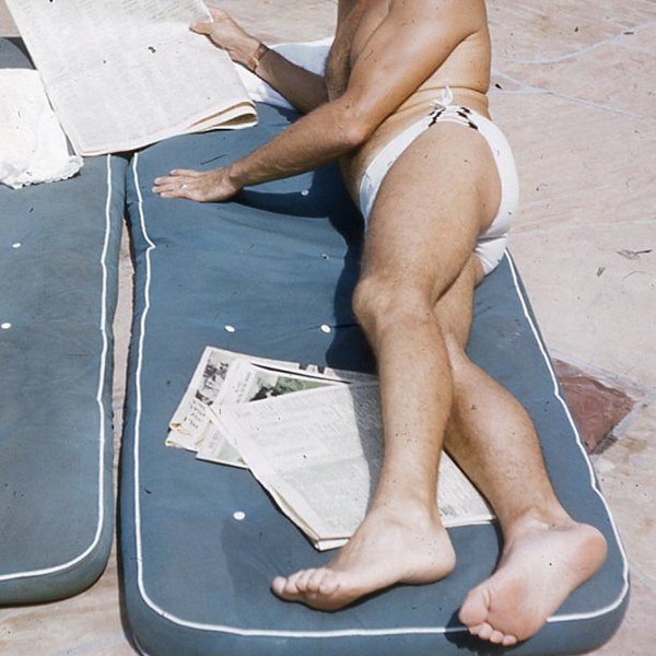 Vintage Photo 35mm Red Border Slide Photo Handsome Beefcake Man Bathing Suit Reading Newspaper Gay Int