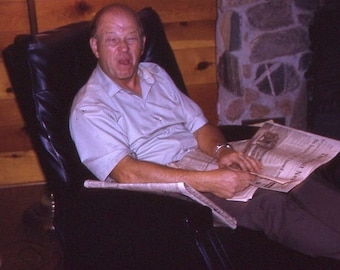 Vintage 35mm Slide Kodachrome Old Man Reading Newspaper Tongue Sticking Out