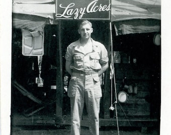 WWII Photo Snapshot Soldier Standing Under A Sign Lazy Acres