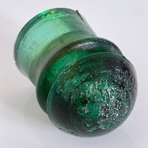 Romanian CD 408 Insulator in Emerald Green Glass with Cold Pitting on the Dome
