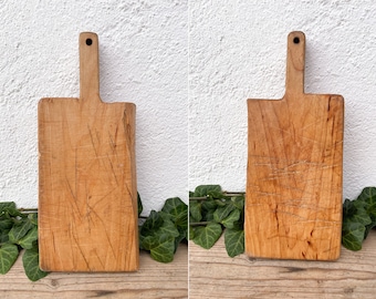 ヴィンテージの木製カッティングボード、原始的な食品写真用小道具