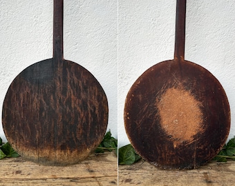 Paleta de pan de madera antigua: decoración rústica para cocinas de granja.