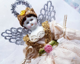 Beautiful handmade angel decoration ,antique Victorian porcelain head, beaded  silk dress with net skirt. Gift boxed ,ribbon.Order for xmas.