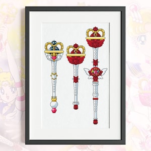 Könnte beinhalten: Vier weiße und goldene Zauberstäbe mit roten und rosa Akzenten und juwelenbesetzten Spitzen. Die Zauberstäbe haben oben ein kronenartiges Design und sind mit weißen Kreisen und einem kleinen Flügeldesign verziert.