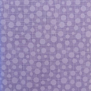 May include: Purple fabric with a white grid pattern and white polka dots.