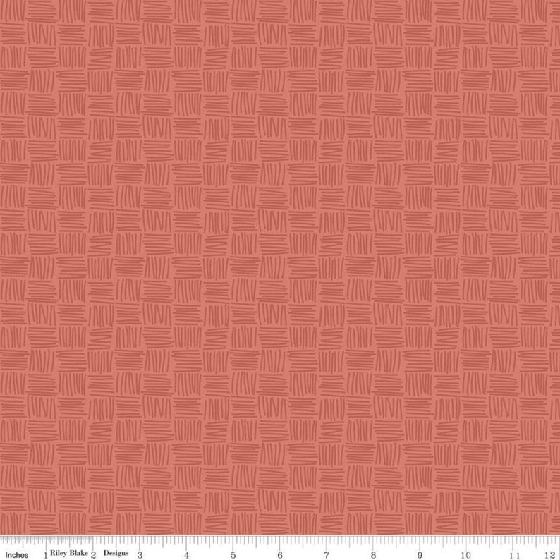 May include: A fabric with a repeating pattern of small, hand-drawn lines arranged in a grid. The lines are a darker shade of the same coral color as the background. The fabric is approximately 12 inches wide.