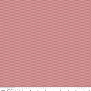 May include: A pink fabric with a repeating pattern of small, dark grey diamonds.