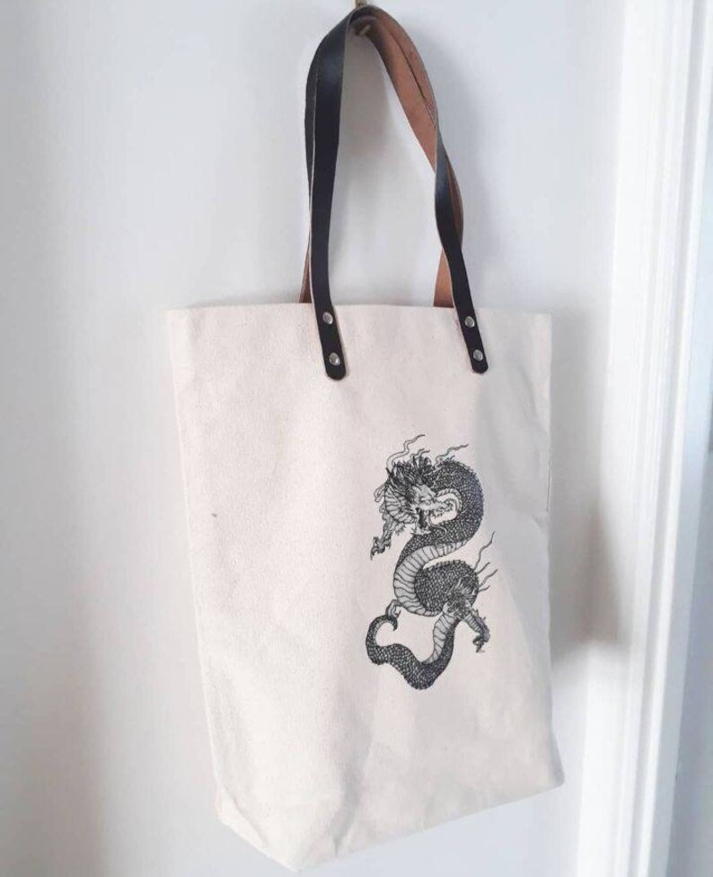 Leather handled tote bag dragon design canvas shopper bag
