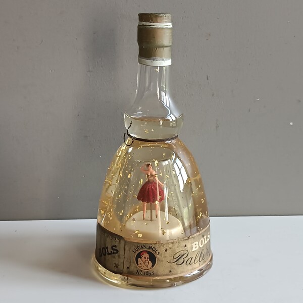 Superbe rare ancienne bouteille musicale Bols Ballerina liqueur pleine scellé paillettes or /boite à musique vintage