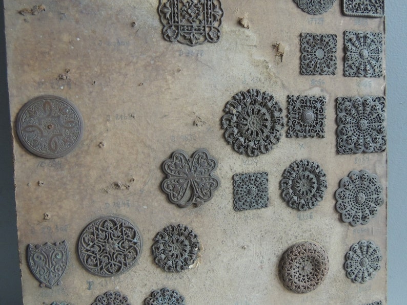 Antique hardware store brass ornaments items plate 19th century embellishments trim furniture or jewelry vintage decoration