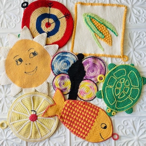 May include: Set of ten crocheted hot pads in various designs, including a sun, a butterfly, a turtle, a fish, a lemon, and a target. The hot pads are all made with colorful yarn and have a variety of textures.