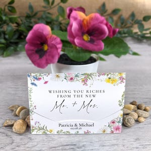 Pastel floral scratch card holders used for wedding favours