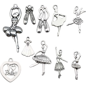 May include: A set of ten silver charm pendants featuring ballerina dancers, ballet shoes, and a heart with the text "I Love Ballet".