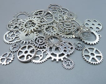 Mezcla de 100 Uds. De dijes de engranajes de plata antiguos, venta al por mayor, colgante steampunk Vintage, pulseras, collares, fabricación de joyas de Metal DIY