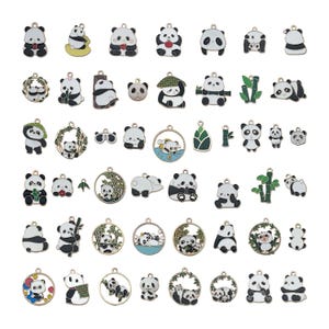 May include: A set of 36 gold-toned metal charms featuring panda bears in various poses and settings. The charms are decorated with black and white enamel paint and feature details like bamboo, leaves, and flowers.