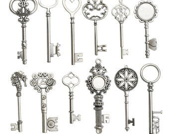 May include: A set of 10 silver-toned skeleton keys with various ornate designs, including a heart, a crown, a flower, and a seahorse. Some keys have blank circular spaces, while others have the word "LOVE" engraved on them.