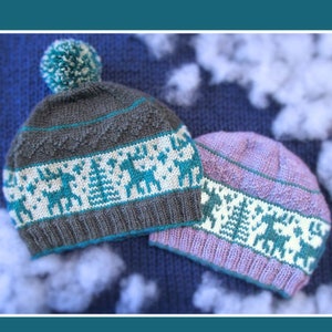 May include: Two knitted winter hats with a reindeer and tree pattern. One hat is gray with a teal pom pom and the other is purple.