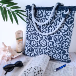 Knit yourself a beach inspired Fair Isle Tote Bag, featuring an overall pattern of Shells and Starfish.  Knit handles feature a trendy design in their construction.