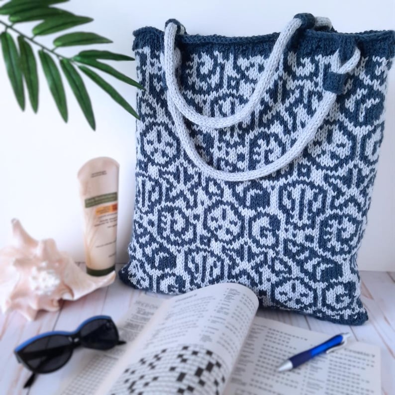 Knit yourself a beach inspired Fair Isle Tote Bag, featuring an overall pattern of Shells and Starfish.  Knit handles feature a trendy design in their construction.