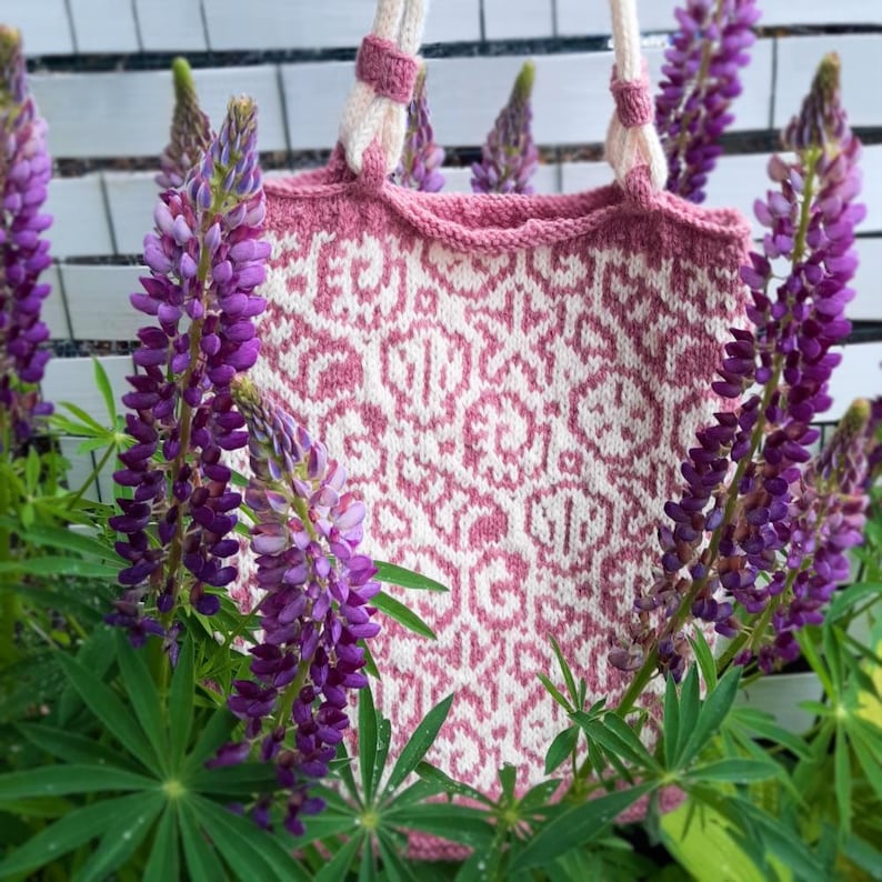 Seashells Tote among lupine flowers