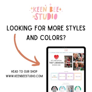 May include: A digital tablet displays a website with the text "GET YOUR OFFICIAL THAT LIBRARIAN BOOKISH GEAR." The image includes the text "LOOKING FOR MORE STYLES AND COLORS?" and "HEAD TO OUR SHOP WWW.KEENBEESTUDIO.COM."