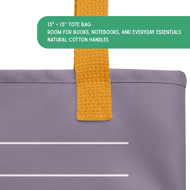 May include: A purple tote bag with a mustard yellow handle. The bag features two horizontal white lines and a green text box stating: 15" x 15" TOTE BAG, ROOM FOR BOOKS, NOTEBOOKS, AND EVERYDAY ESSENTIALS, NATURAL COTTON HANDLES.