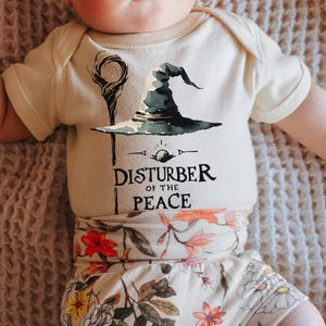 Disturber of the Peace Fantasy Book Lover Funny Baby Onesie©