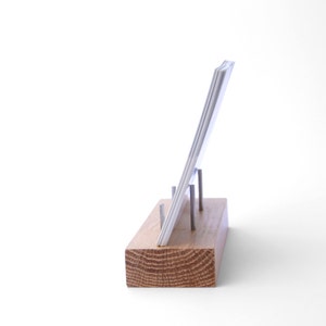postcard display stand made from oak with stainless steel supports