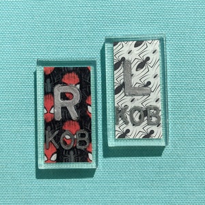 One set of X-ray markers right and left with Spiderman theme background comic book