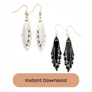 May include: Two pairs of ghost-shaped dangle earrings with gold-toned hooks. One pair is silver with black moon and star details, and the other pair is black with white moon and star details. The text Instant Download appears below the earrings.