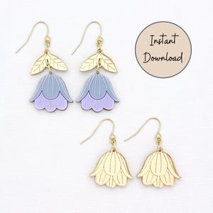 Puede incluir: Dos pares de pendientes colgantes con ganchos dorados. Un par presenta hojas doradas sobre dijes en forma de campana de color azul y lavanda. El segundo par consiste en dijes dorados en forma de campana. Un círculo gráfico dice Instant Download.