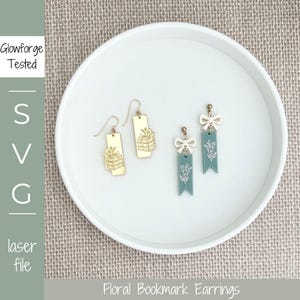May include: Four pairs of earrings on a white plate. Two pairs are gold-coloured rectangles with gift box designs. The other two are teal-coloured with a floral design and a bow. The text "Glowforge Tested" and "SVG laser file" is visible.