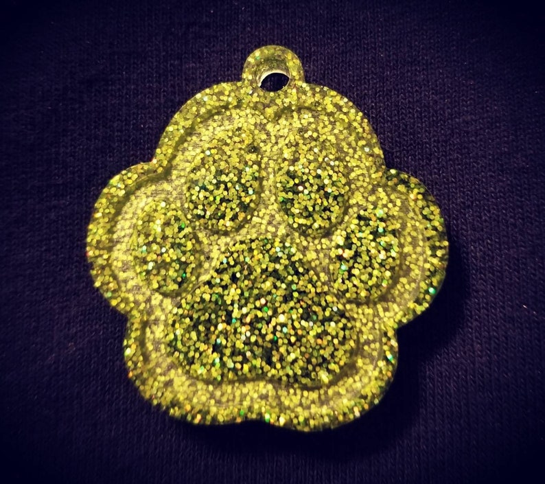 Carry the love for your pet with your keys! Glitter Paw Keychain Many color options