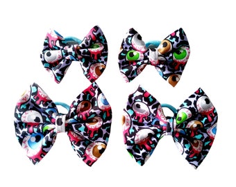 Halloween themed hair bows,toddler bows,hair clips,hair bobbles, eyeball fabric,cute bows