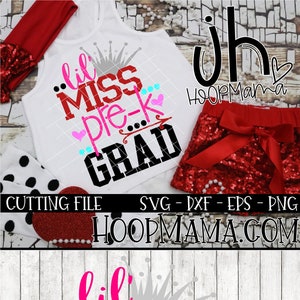 May include: A green, pink, and black design with the text "Lil Miss Pre-K Grad" and a crown. The design is on a white background with a wood grain texture.