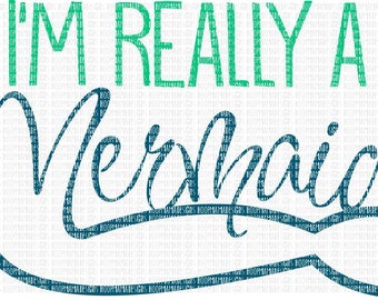 May include: A teal blue and green graphic design with the text "I'm really a mermaid" in a cursive font. The text is on a white background.