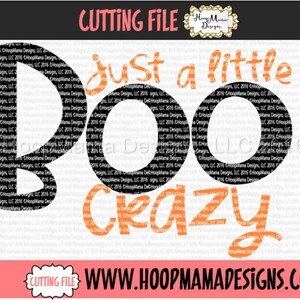 May include: A black and orange Halloween-themed design with the text "Just a little Boo Crazy".