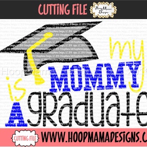 May include: A black and white graduation cap with a yellow tassel, and the text "my mommy is a graduate" in blue, yellow, and black letters.