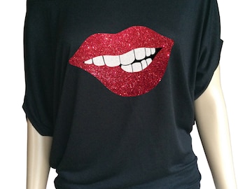 Lady's loose top with red glitter lips. Amazing!