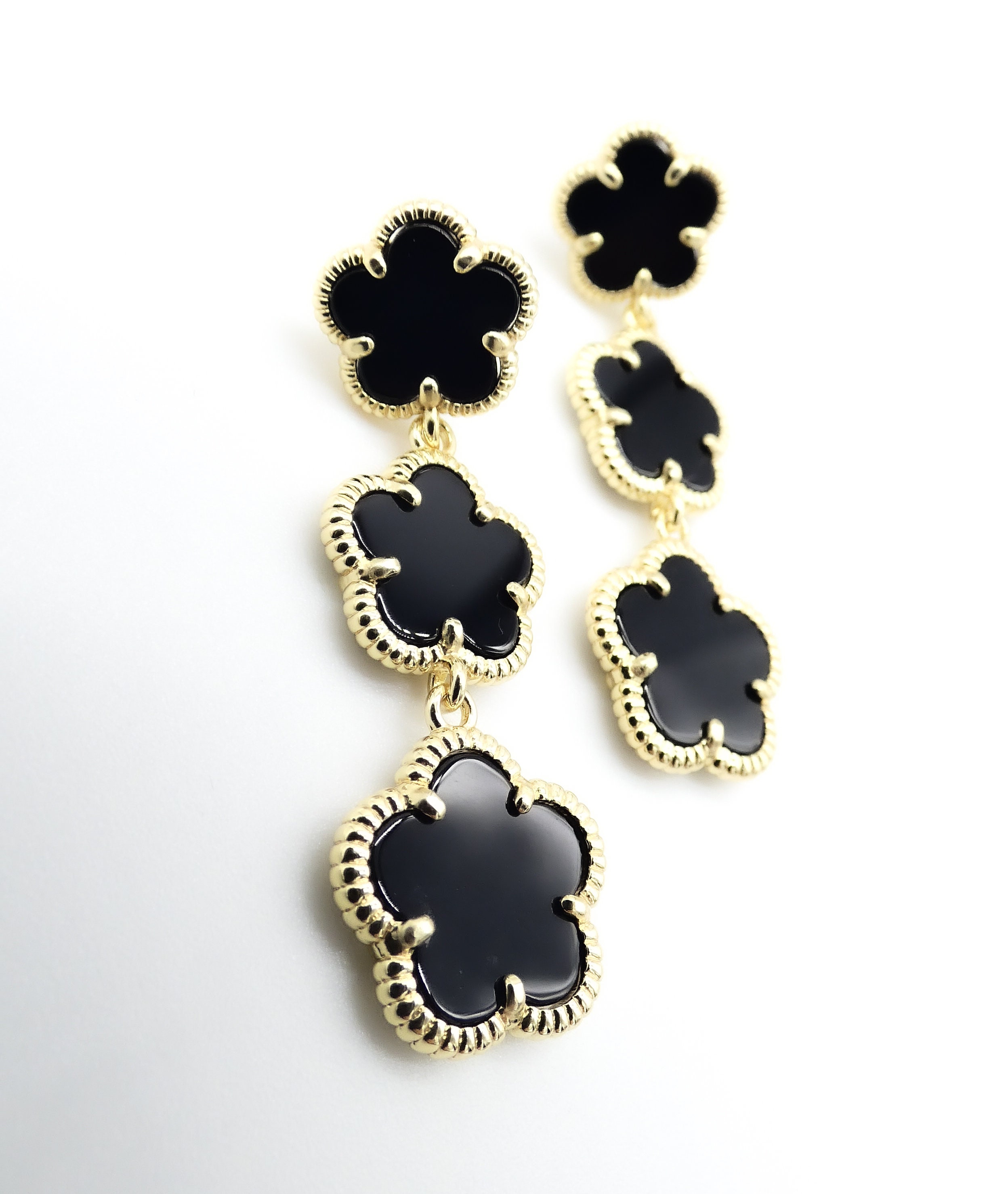 Van cleef black earrings deals