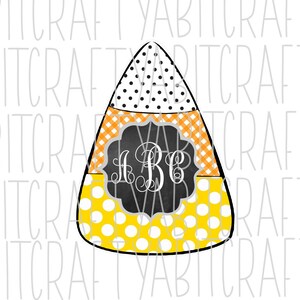 May include: A yellow, orange and white candy corn with black polka dots. The candy corn has a grey and black circle in the centre with the letters "A B C" in white.