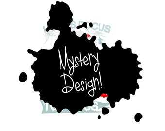 May include: Black ink splatter with the text "Mystery Design!" in white. The splatter is on a white background.