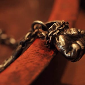 Defend Dignity- Silver fist Necklace- The power of Justice- The fist of Justice- Boxing champion Ali- The struggle of rights-Game of Thrones